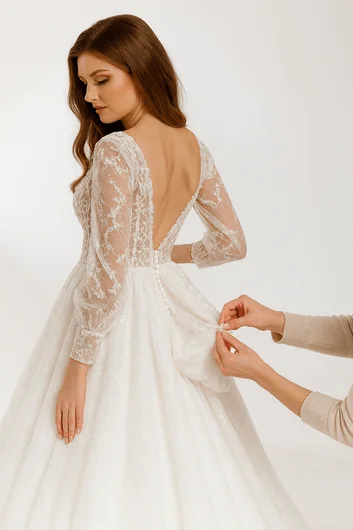 Emergency bustle addition services showing fast train management for urgent wedding preparations